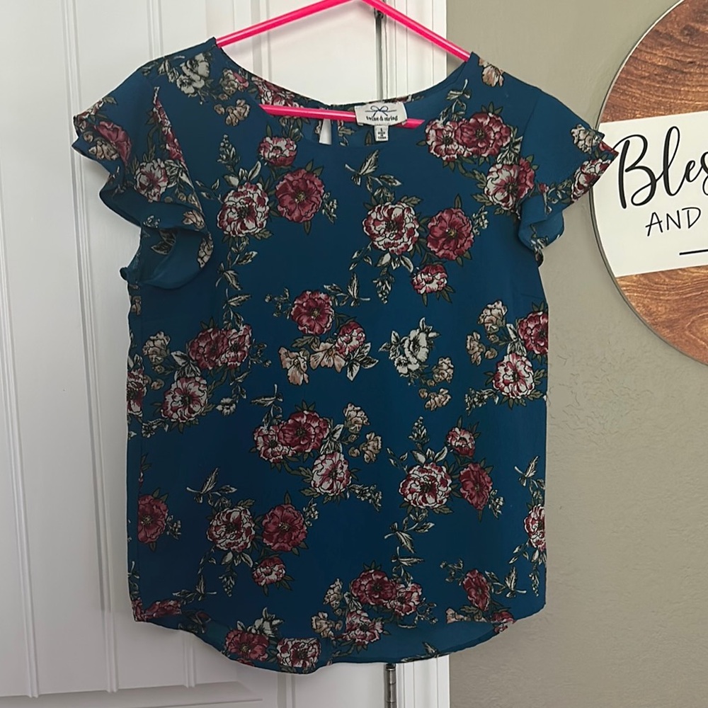 Blue Ruffled Blouse with Pink Floral Pattern